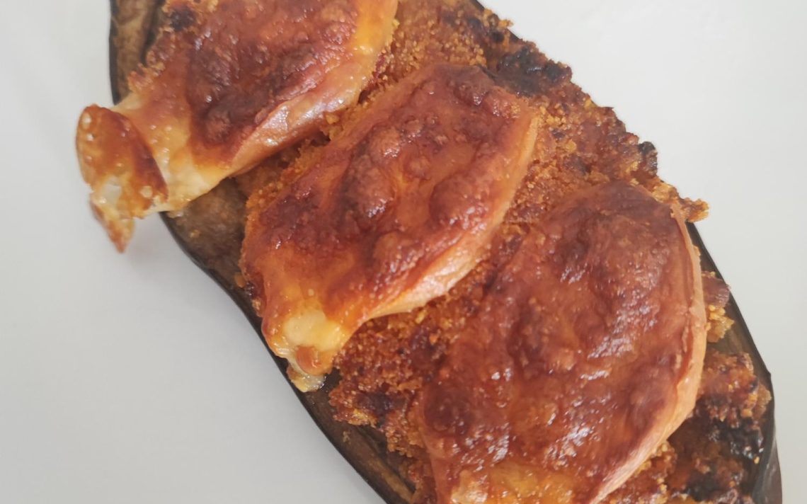 Melanzane ripiene con pomodorini e scamorza